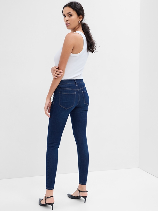 Image number 2 showing, Mid Rise Universal Skinny Jeans