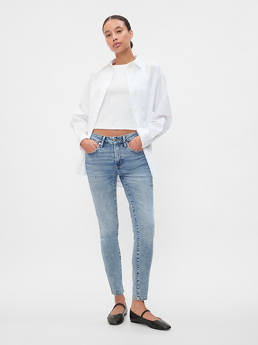 Image number 1 showing, Mid Rise Universal Skinny Jeans