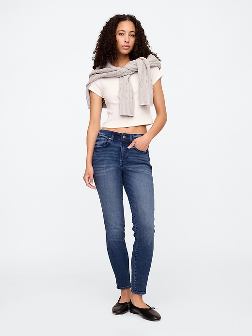 Image number 1 showing, Mid Rise Universal Skinny Jeans