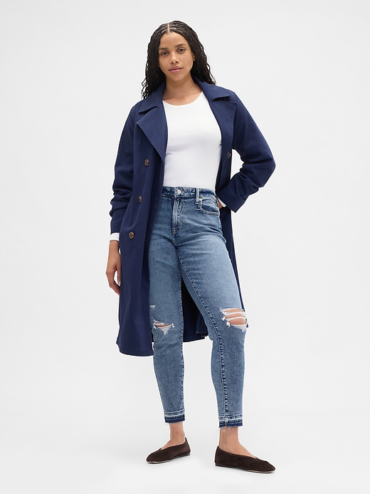 Image number 5 showing, Mid Rise Destructed Universal Skinny Jeans