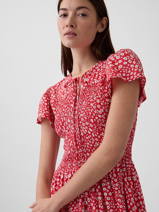 Image number 3 showing, Smocked Flutter Sleeve Midi Dress