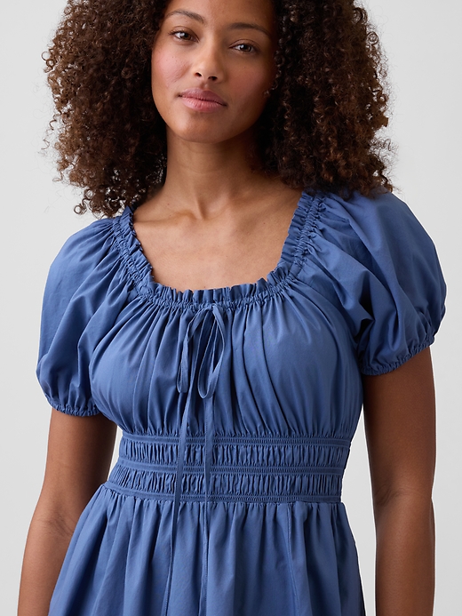 L'image numéro 3 présente Robe mi-longue à manches bouffantes