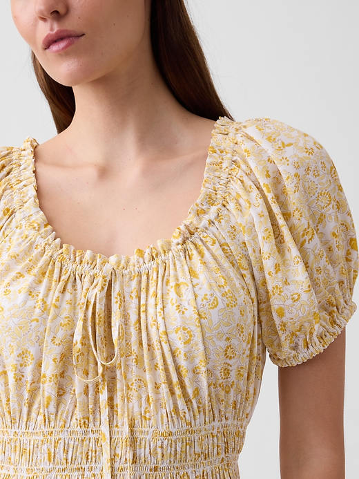 L'image numéro 3 présente Robe mi-longue à manches bouffantes