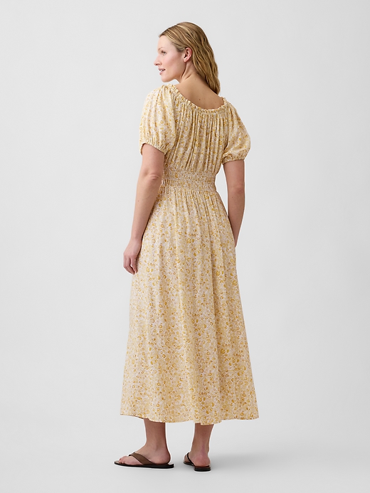 L'image numéro 5 présente Robe mi-longue à manches bouffantes